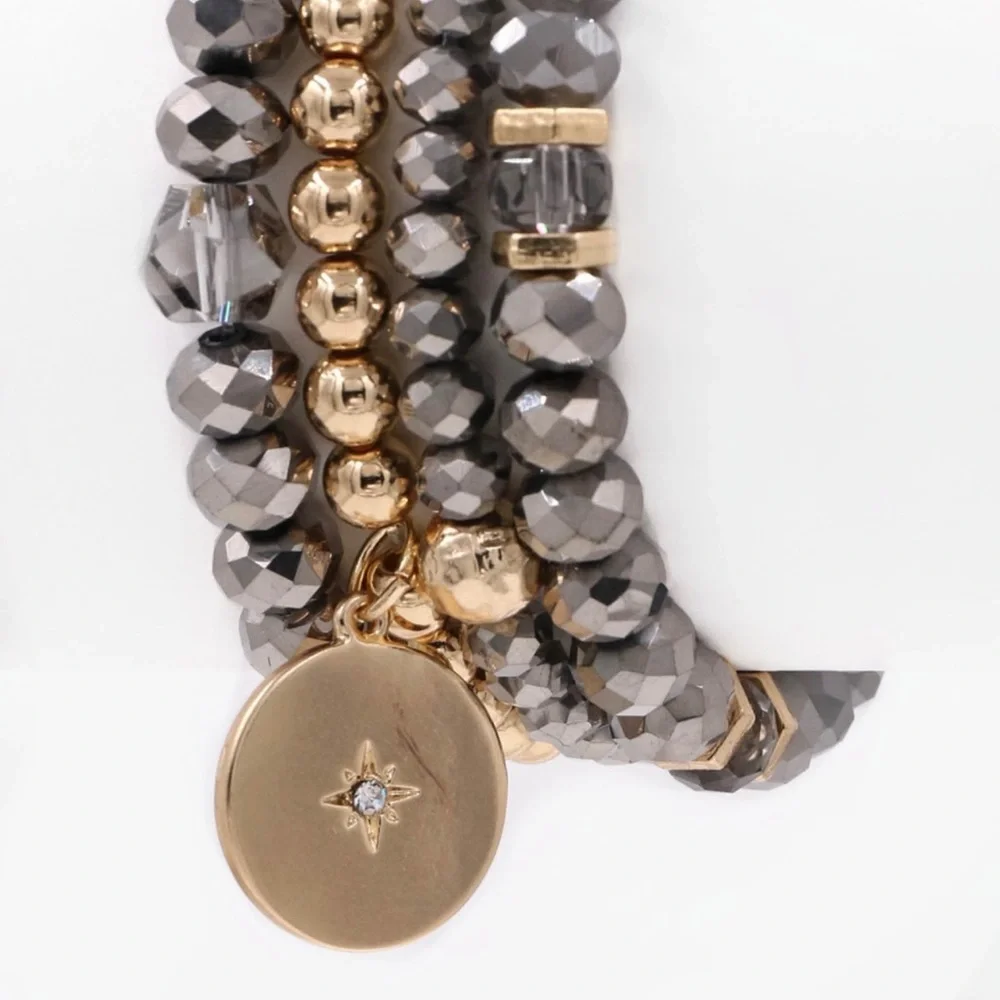 This beautiful bracelet stack will go with everything in your closet! - Picture 1 of 3